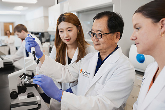 student researchers in lab